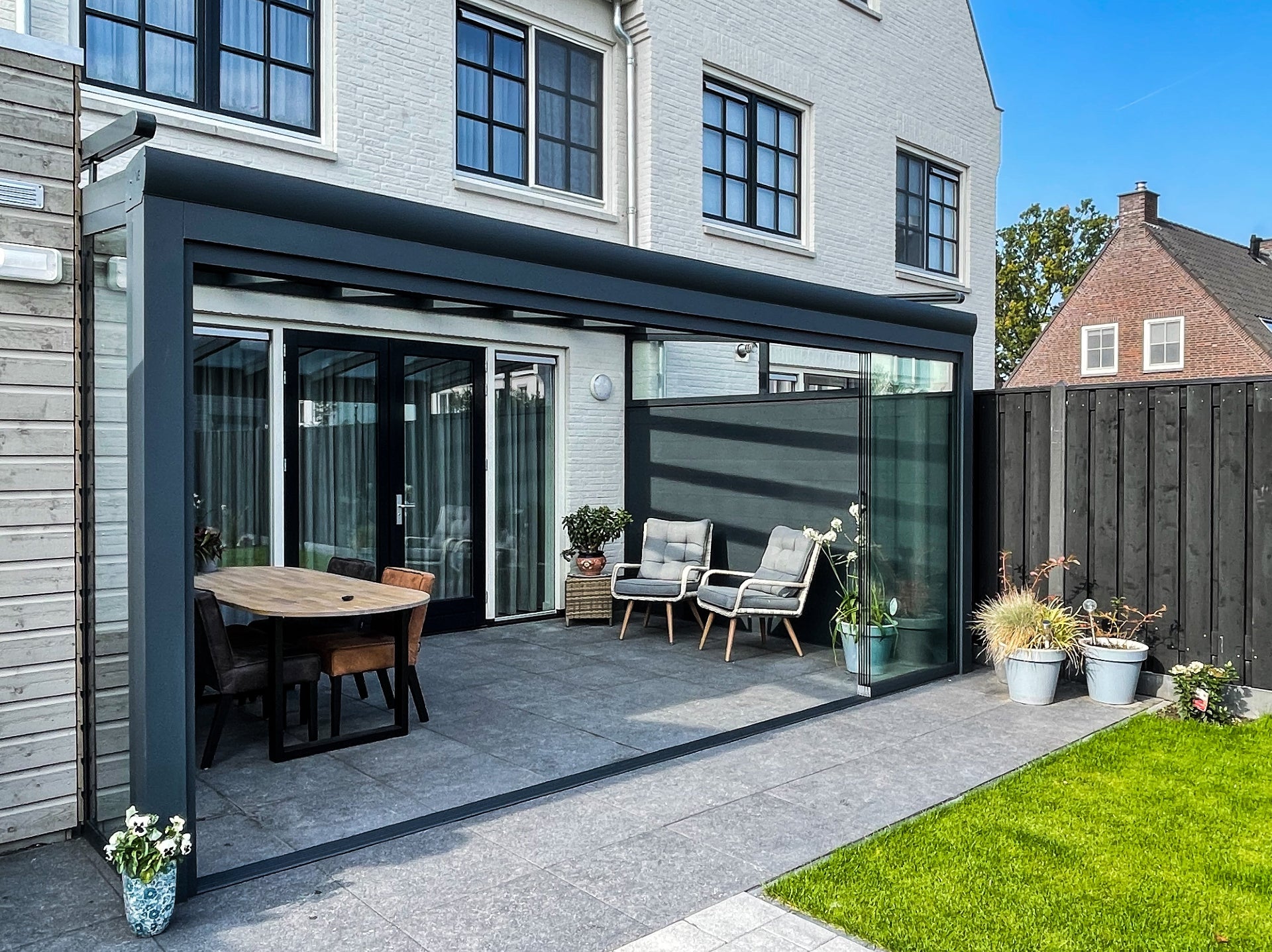 Complete tuinkamer met glazen schuifwand.jpg